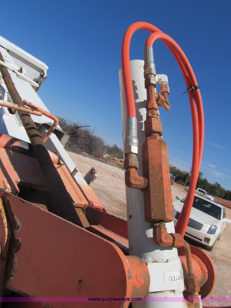 image for item F3053 2000 GMC C7500 digger derrick truck