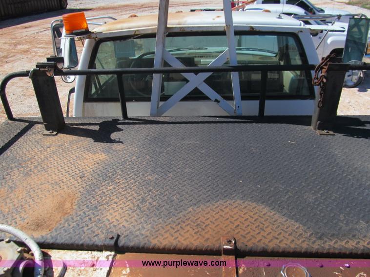 image for item F3053 2000 GMC C7500 digger derrick truck