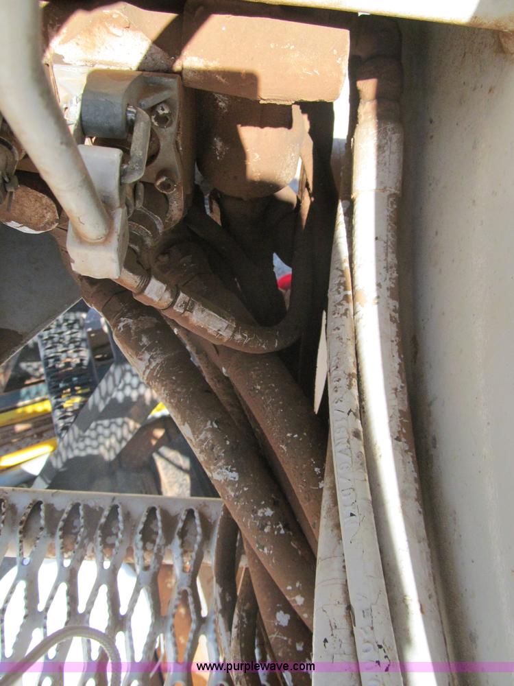 image for item F3053 2000 GMC C7500 digger derrick truck