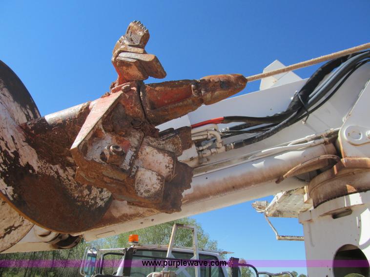 image for item F3053 2000 GMC C7500 digger derrick truck