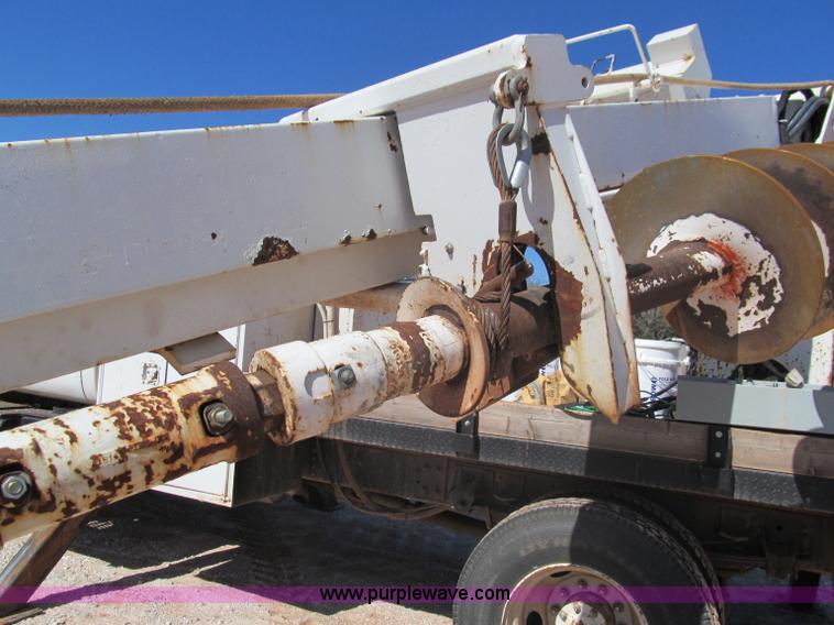 image for item F3053 2000 GMC C7500 digger derrick truck