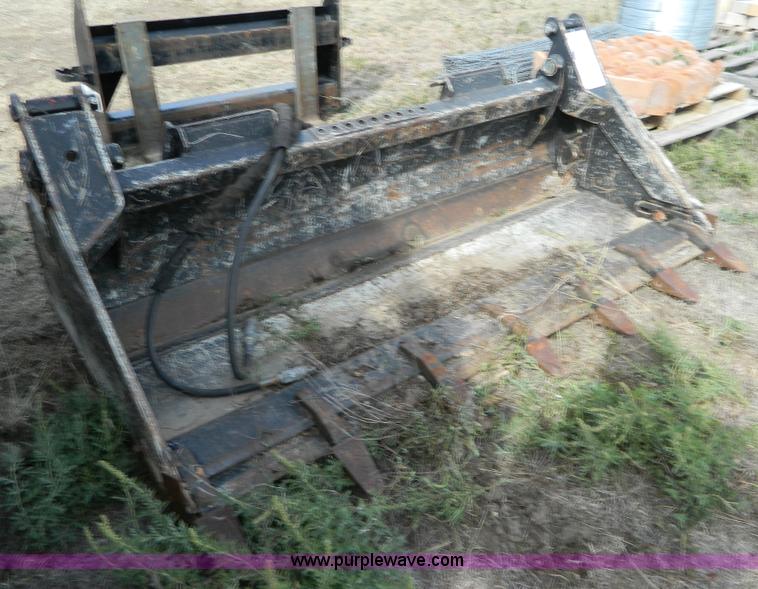 John Deere MP Pro 72" clam shell rock tooth skid steer bucket in Hays