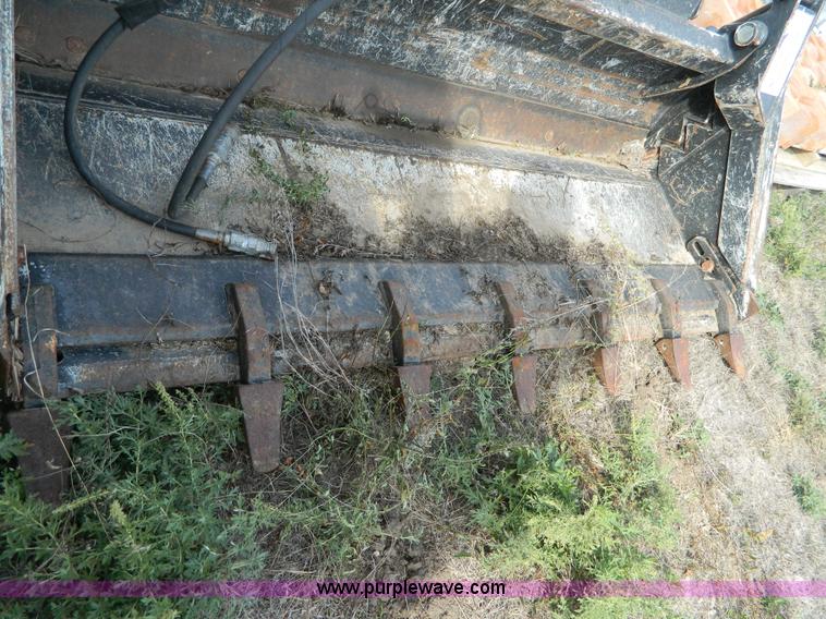 image for item G7517 John Deere MP Pro 72" clam shell rock tooth skid steer bucket