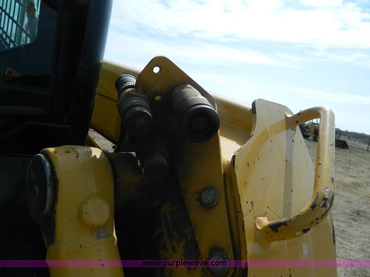 image for item G7518 2006 John Deere 320 skid steer