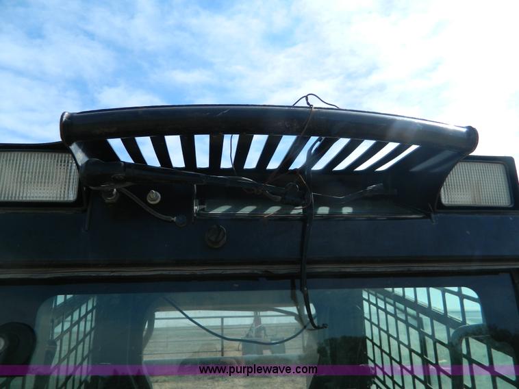 image for item G7518 2006 John Deere 320 skid steer