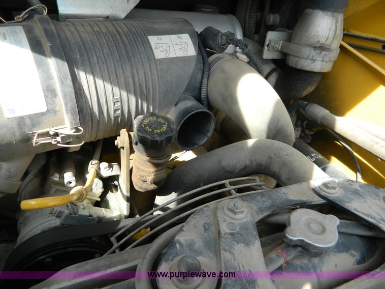 image for item G7518 2006 John Deere 320 skid steer