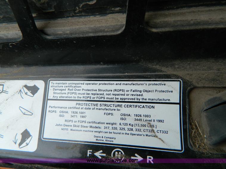 image for item G7518 2006 John Deere 320 skid steer