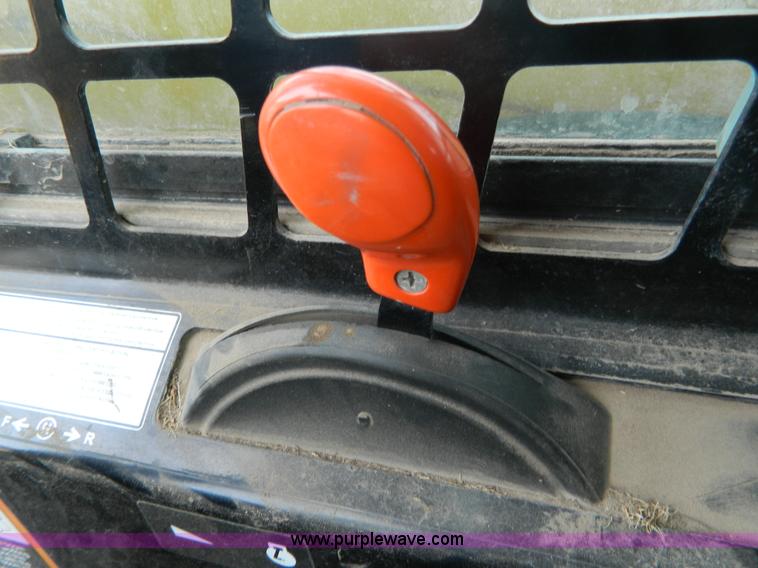 image for item G7518 2006 John Deere 320 skid steer