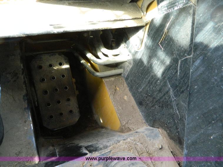 image for item G7518 2006 John Deere 320 skid steer