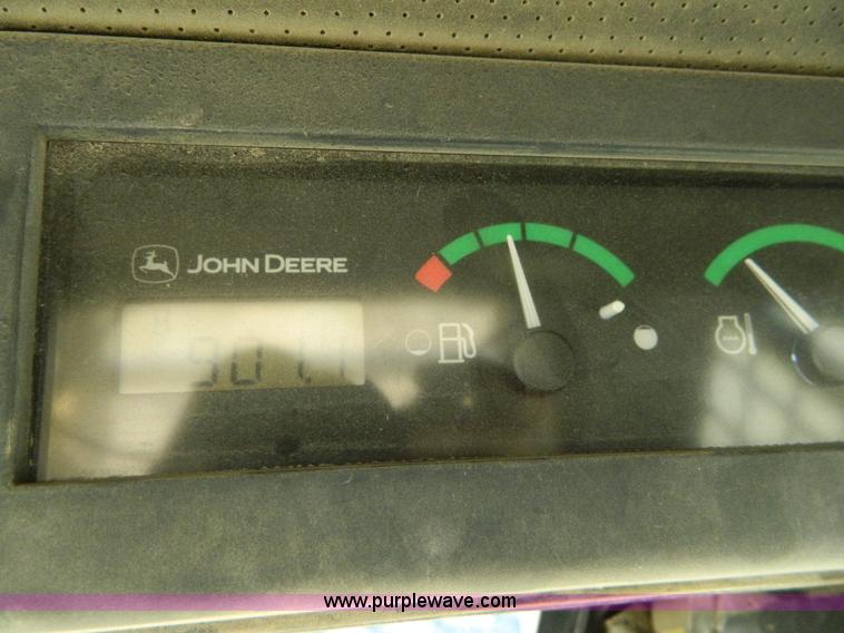 image for item G7518 2006 John Deere 320 skid steer