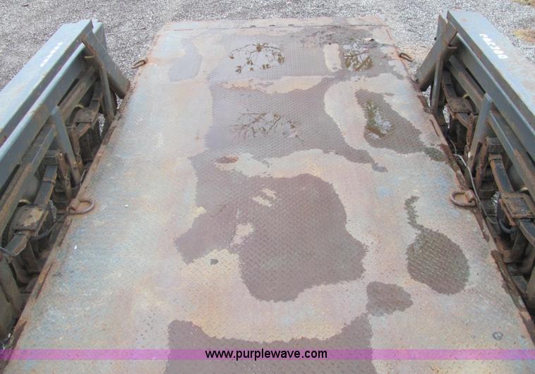 image for item C2933 2007 JLG 7614 tandem axle drop deck flatbed trailer