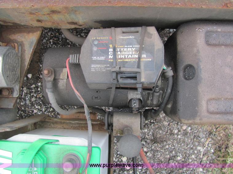 image for item C2933 2007 JLG 7614 tandem axle drop deck flatbed trailer