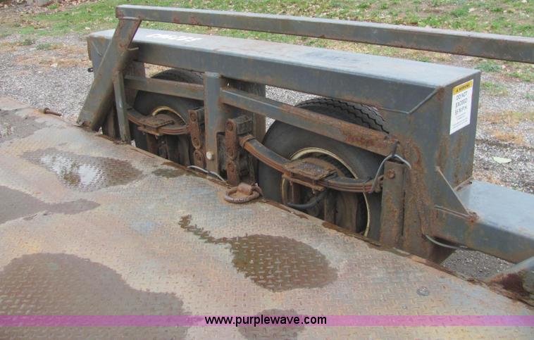 image for item C2933 2007 JLG 7614 tandem axle drop deck flatbed trailer