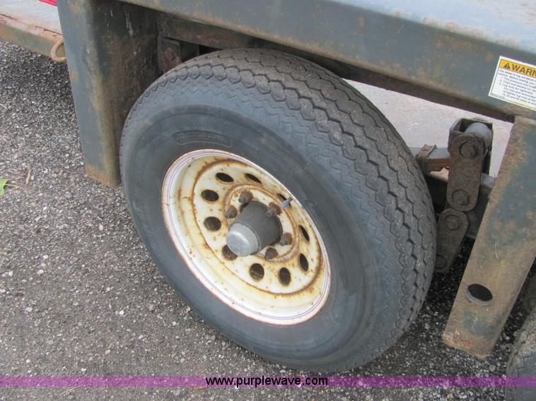 image for item C2933 2007 JLG 7614 tandem axle drop deck flatbed trailer