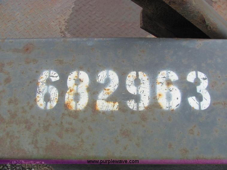 image for item C2933 2007 JLG 7614 tandem axle drop deck flatbed trailer