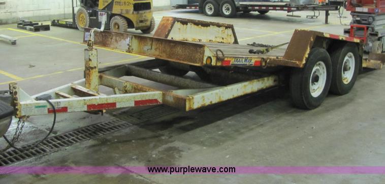 image for item C2938 2006 Trailmax T12UT tilt deck tandem axle trailer