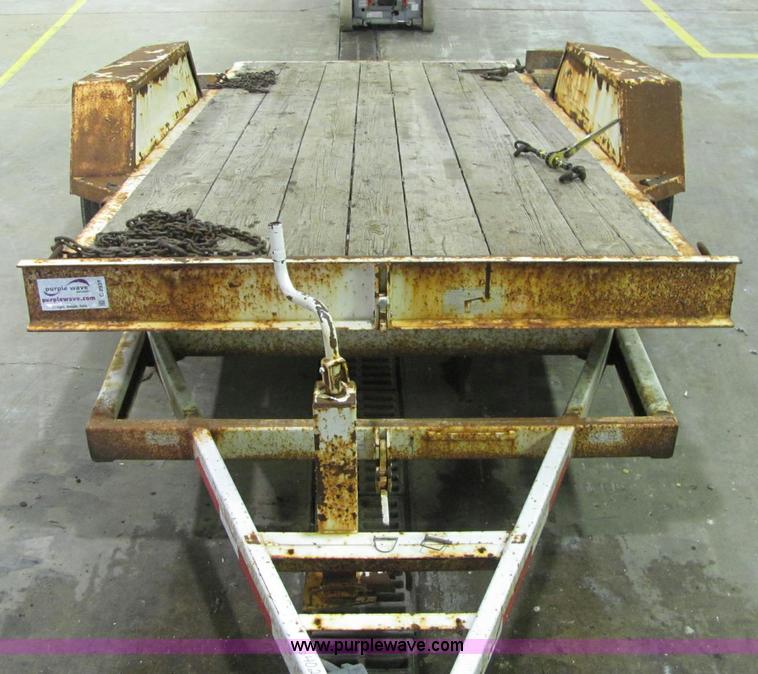 image for item C2938 2006 Trailmax T12UT tilt deck tandem axle trailer