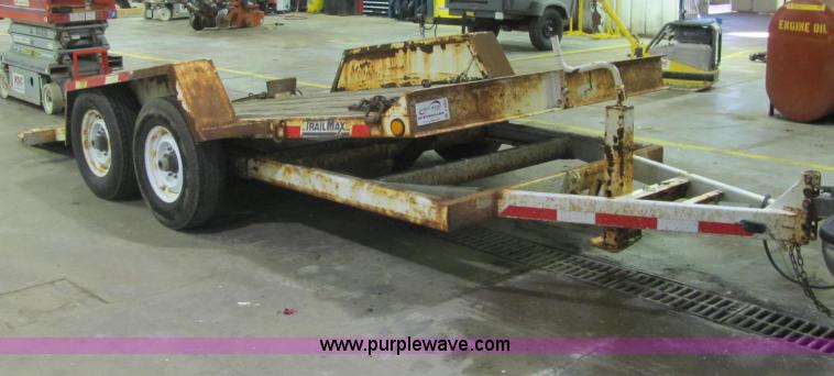 image for item C2938 2006 Trailmax T12UT tilt deck tandem axle trailer