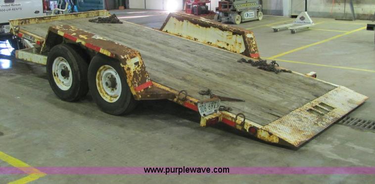 image for item C2938 2006 Trailmax T12UT tilt deck tandem axle trailer