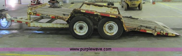 image for item C2938 2006 Trailmax T12UT tilt deck tandem axle trailer