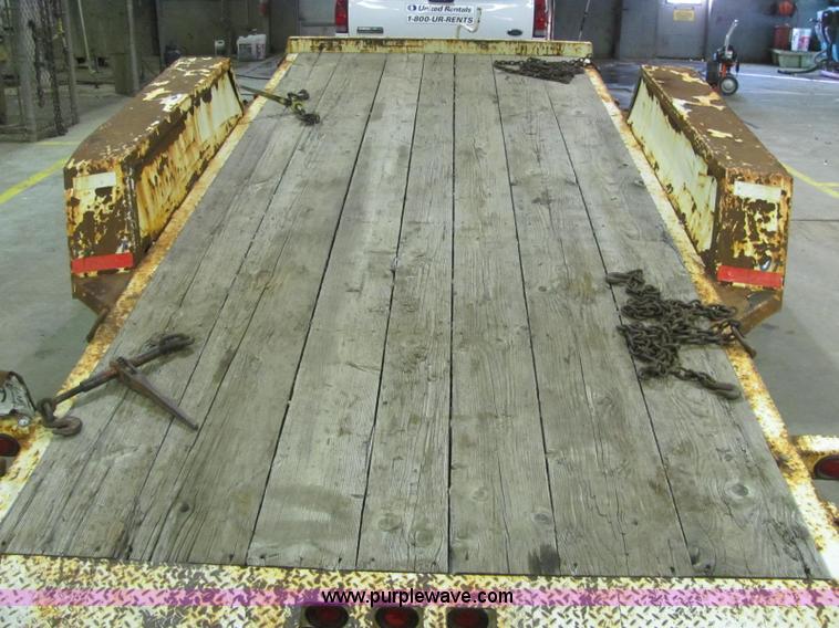 image for item C2938 2006 Trailmax T12UT tilt deck tandem axle trailer