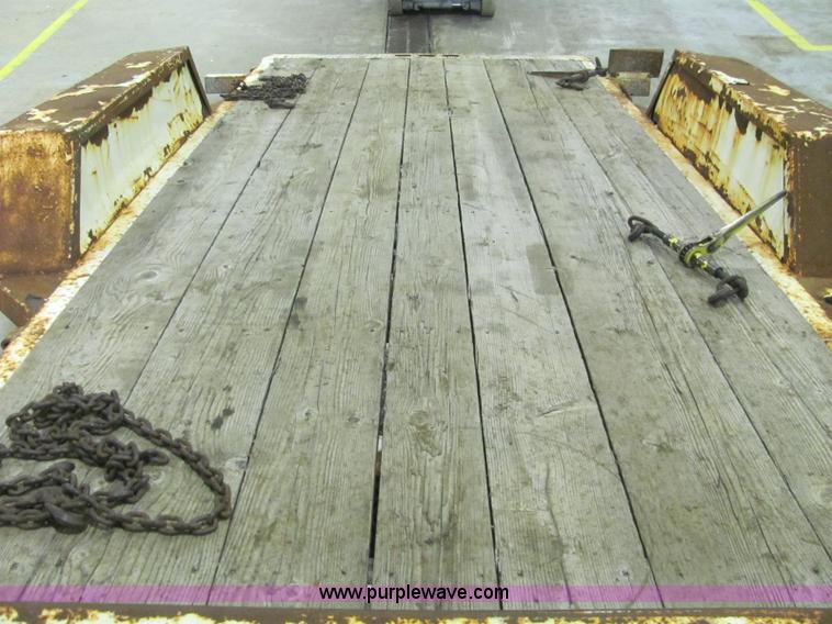 image for item C2938 2006 Trailmax T12UT tilt deck tandem axle trailer