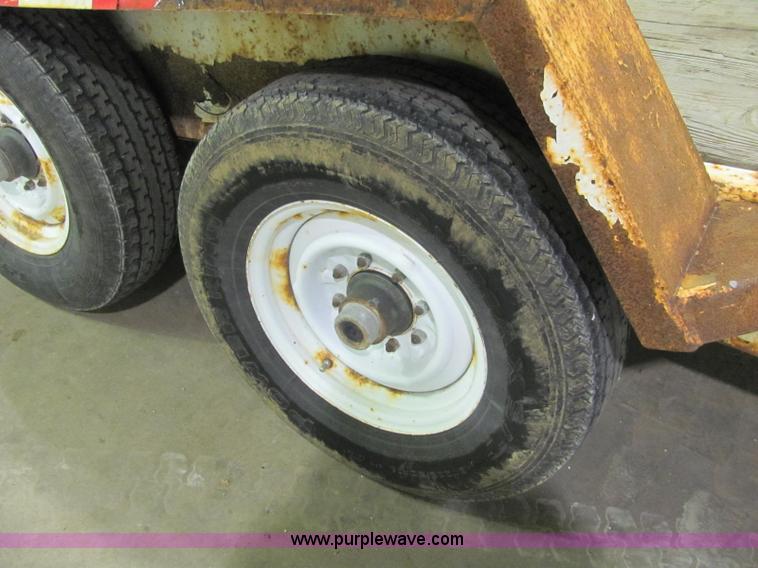 image for item C2938 2006 Trailmax T12UT tilt deck tandem axle trailer