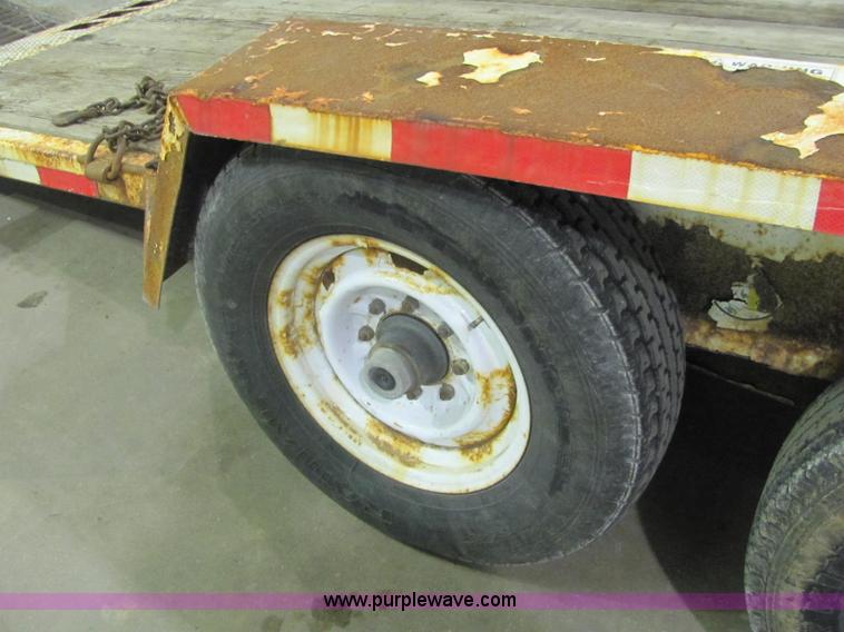 image for item C2938 2006 Trailmax T12UT tilt deck tandem axle trailer