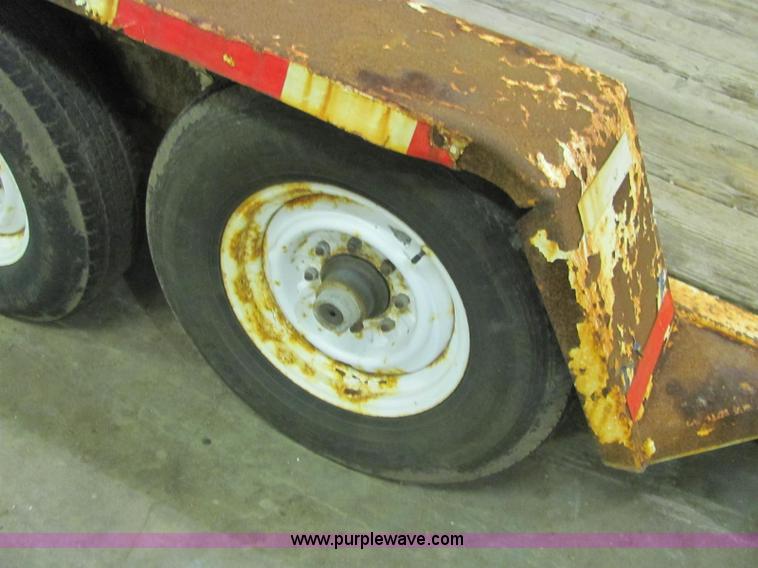 image for item C2938 2006 Trailmax T12UT tilt deck tandem axle trailer