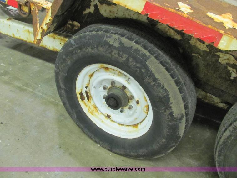 image for item C2938 2006 Trailmax T12UT tilt deck tandem axle trailer