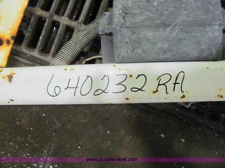 image for item C2938 2006 Trailmax T12UT tilt deck tandem axle trailer