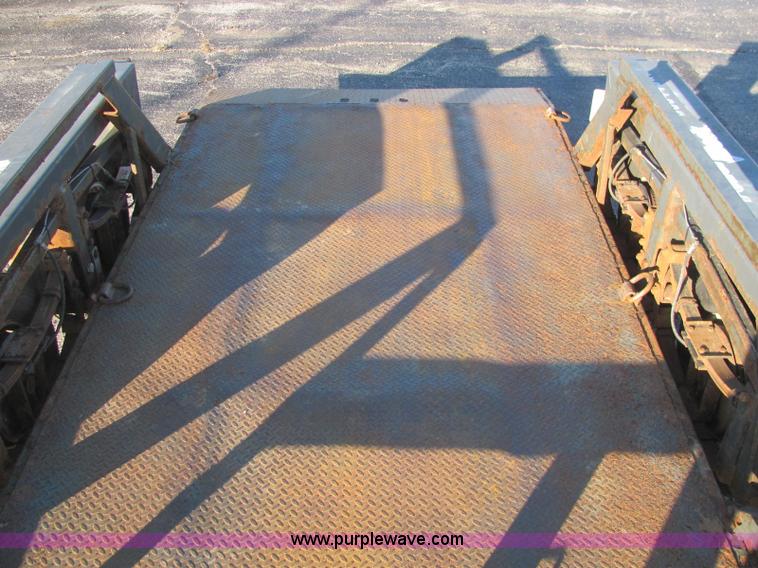 image for item C2939 2004 JLG 7612 tandem axle drop deck flatbed trailer