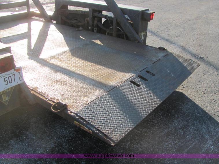 image for item C2939 2004 JLG 7612 tandem axle drop deck flatbed trailer