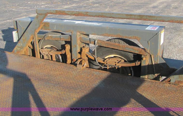 image for item C2939 2004 JLG 7612 tandem axle drop deck flatbed trailer