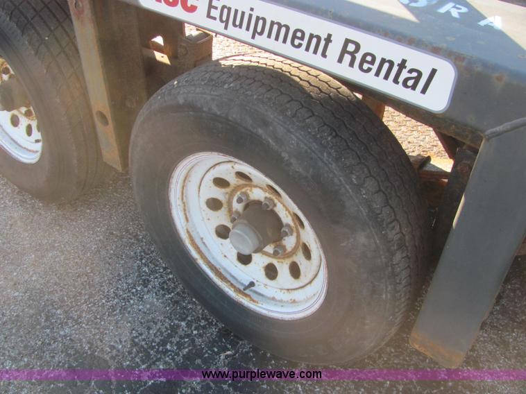 image for item C2939 2004 JLG 7612 tandem axle drop deck flatbed trailer