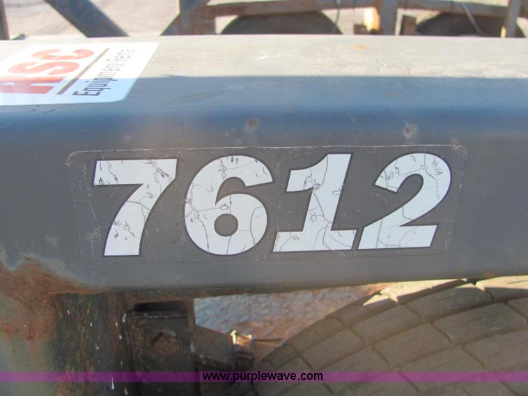 image for item C2939 2004 JLG 7612 tandem axle drop deck flatbed trailer