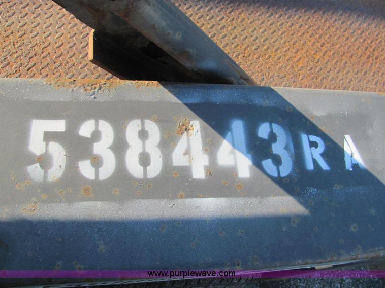 image for item C2939 2004 JLG 7612 tandem axle drop deck flatbed trailer