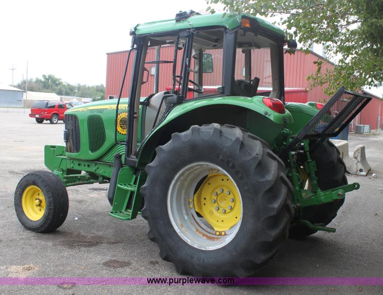image for item E4062 2007 John Deere 6415 tractor