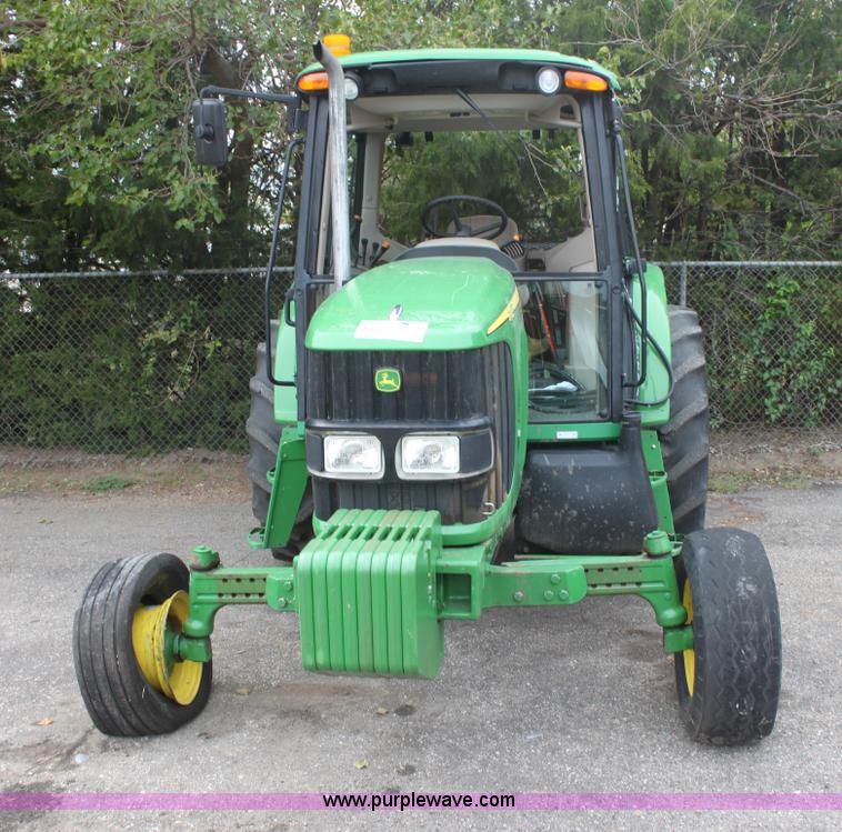 image for item E4062 2007 John Deere 6415 tractor