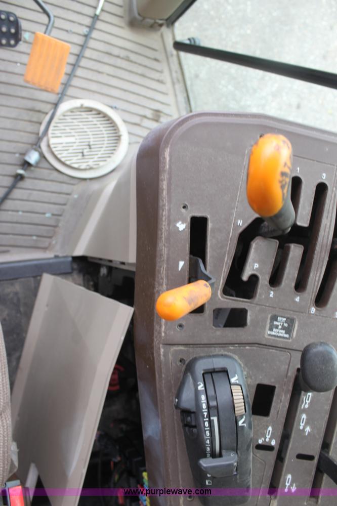 image for item E4062 2007 John Deere 6415 tractor