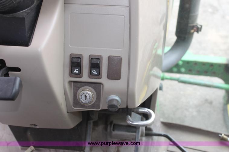 image for item E4062 2007 John Deere 6415 tractor