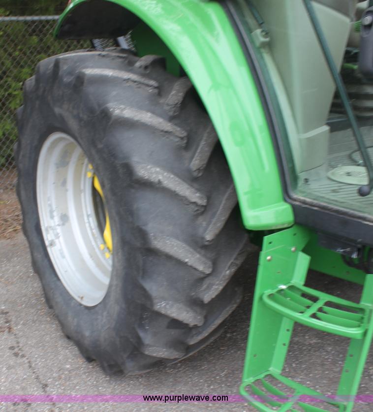 image for item E4062 2007 John Deere 6415 tractor