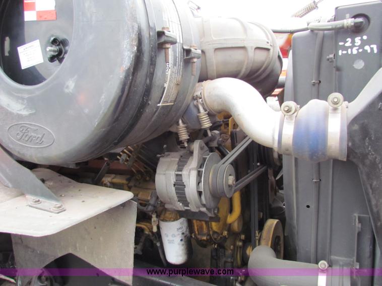 image for item E4087 1997 Ford LNT9000 flatbed truck