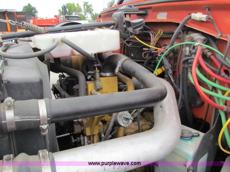 image for item E4087 1997 Ford LNT9000 flatbed truck