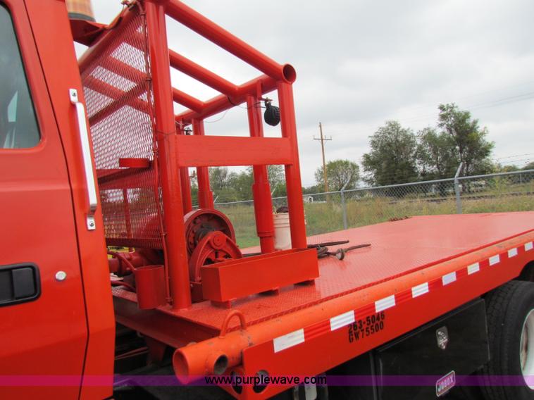 image for item E4087 1997 Ford LNT9000 flatbed truck