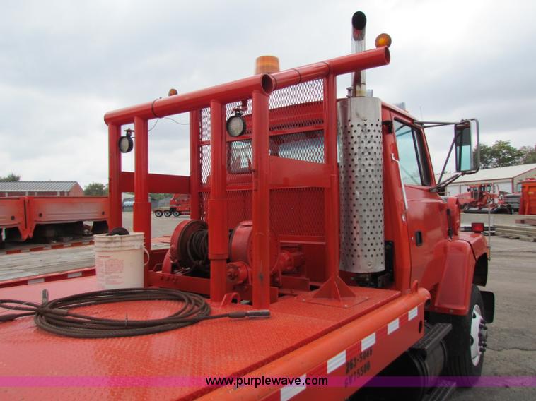 image for item E4087 1997 Ford LNT9000 flatbed truck