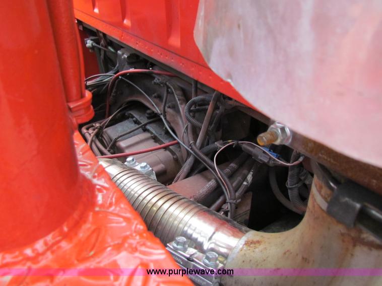 image for item E4087 1997 Ford LNT9000 flatbed truck