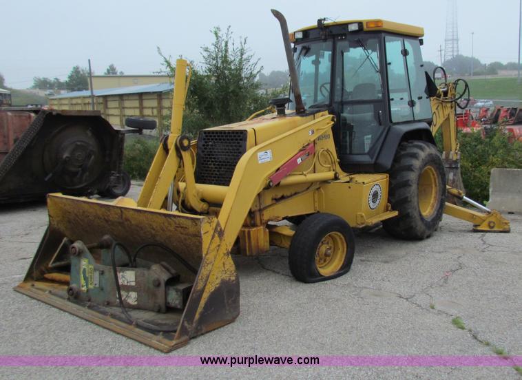 image for item E4106 1997 John Deere 310E backhoe