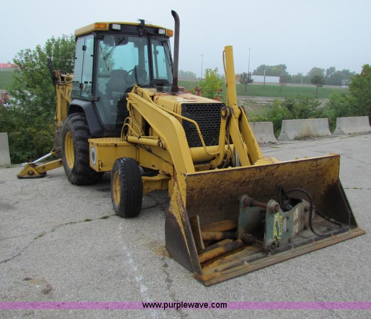 image for item E4106 1997 John Deere 310E backhoe