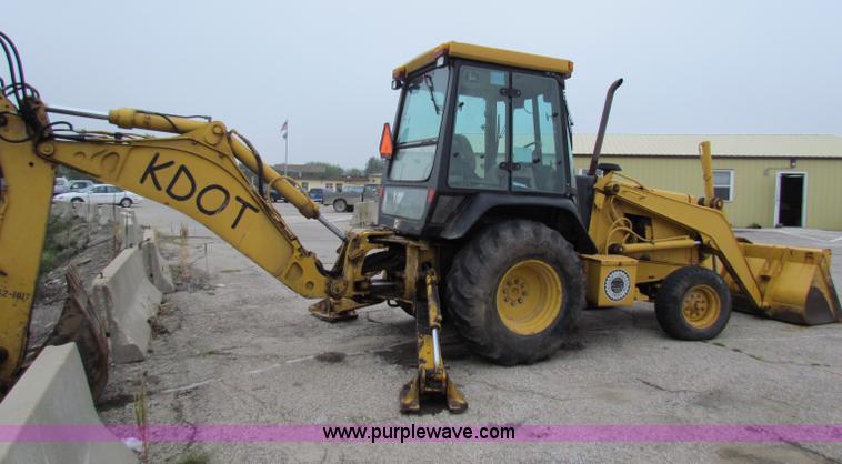 image for item E4106 1997 John Deere 310E backhoe